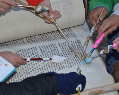 simchat torah hands closeup- smaller.png